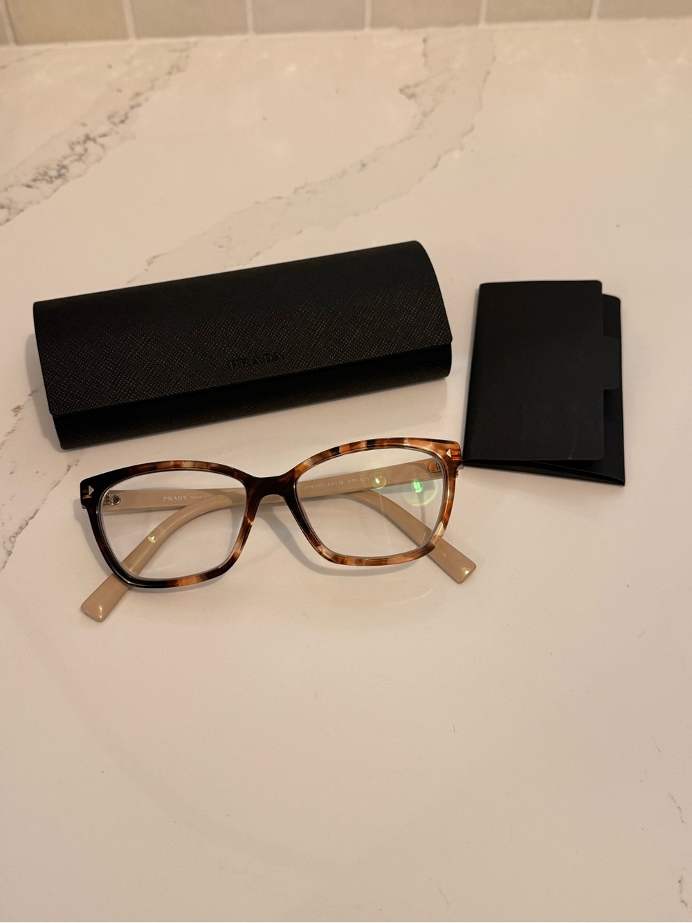 Prada Women's Tortoiseshell Cat-Eye Glasses in Brown and Beige